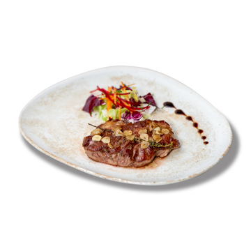 Ceafa iberica la tigaie infuzata cu usturoi-180g